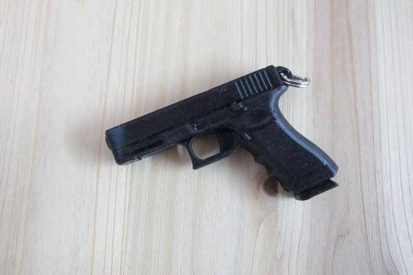 Schlüsselanhänger Pistole